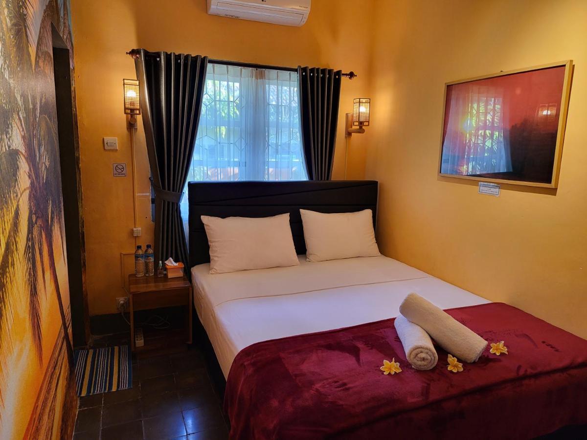 Dewi Sri Guesthouse Матарам Екстериор снимка