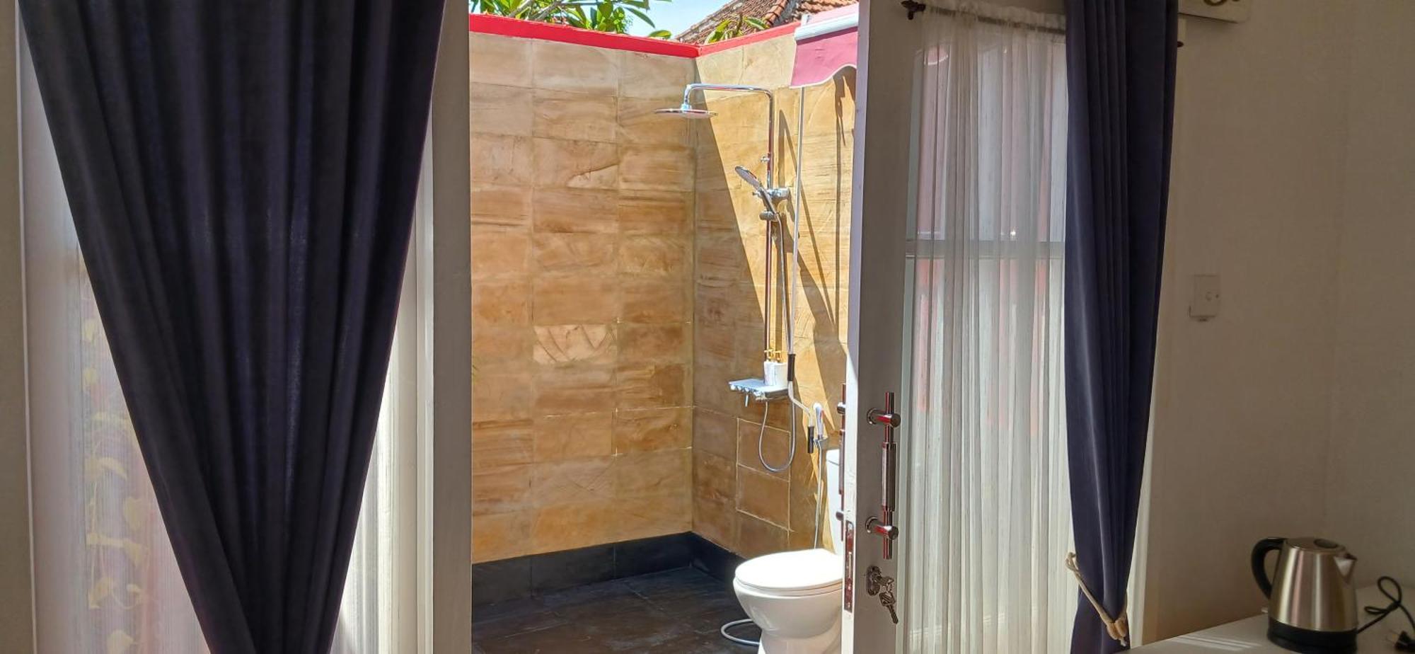 Dewi Sri Guesthouse Матарам Екстериор снимка