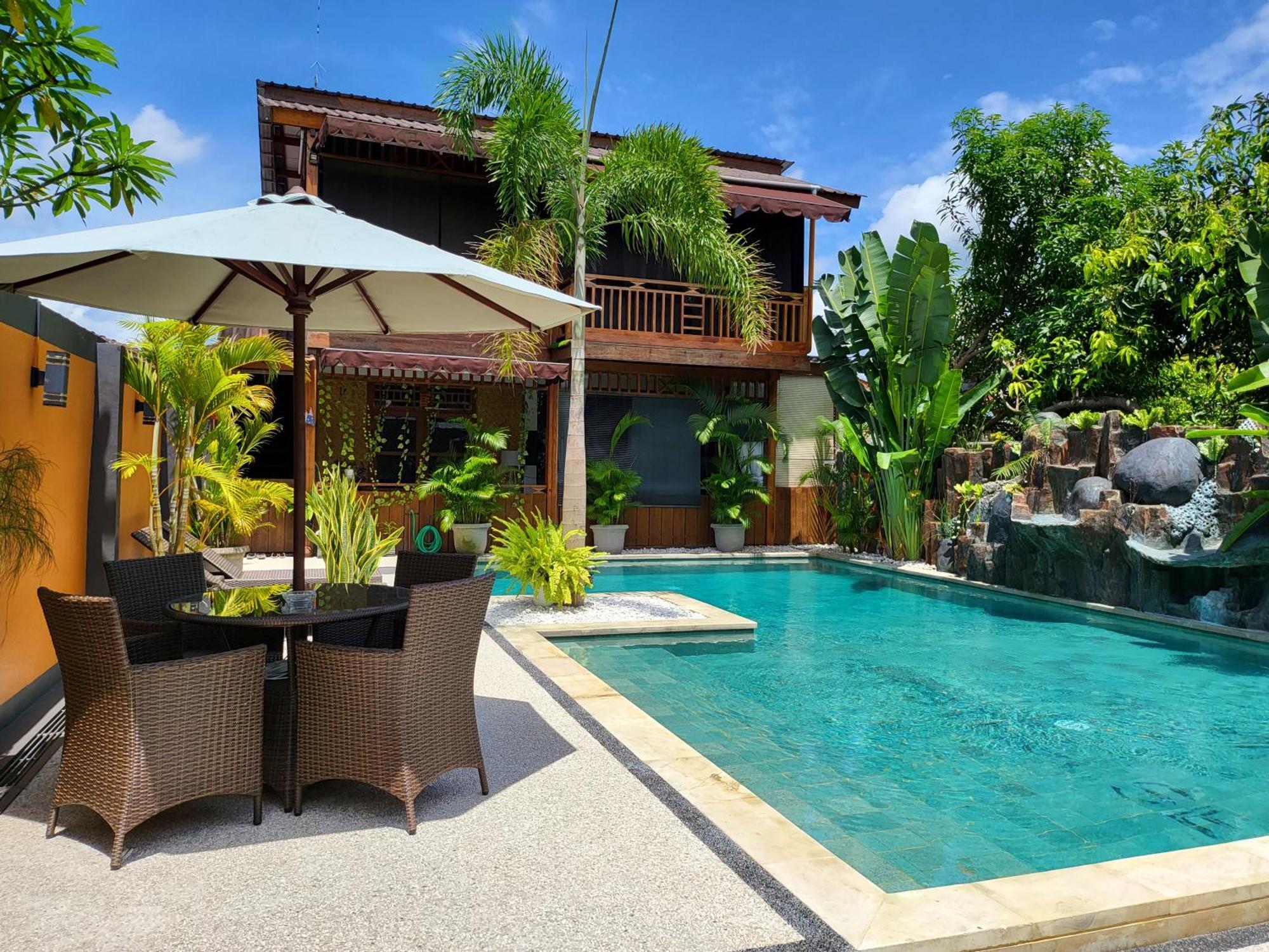 Dewi Sri Guesthouse Матарам Екстериор снимка